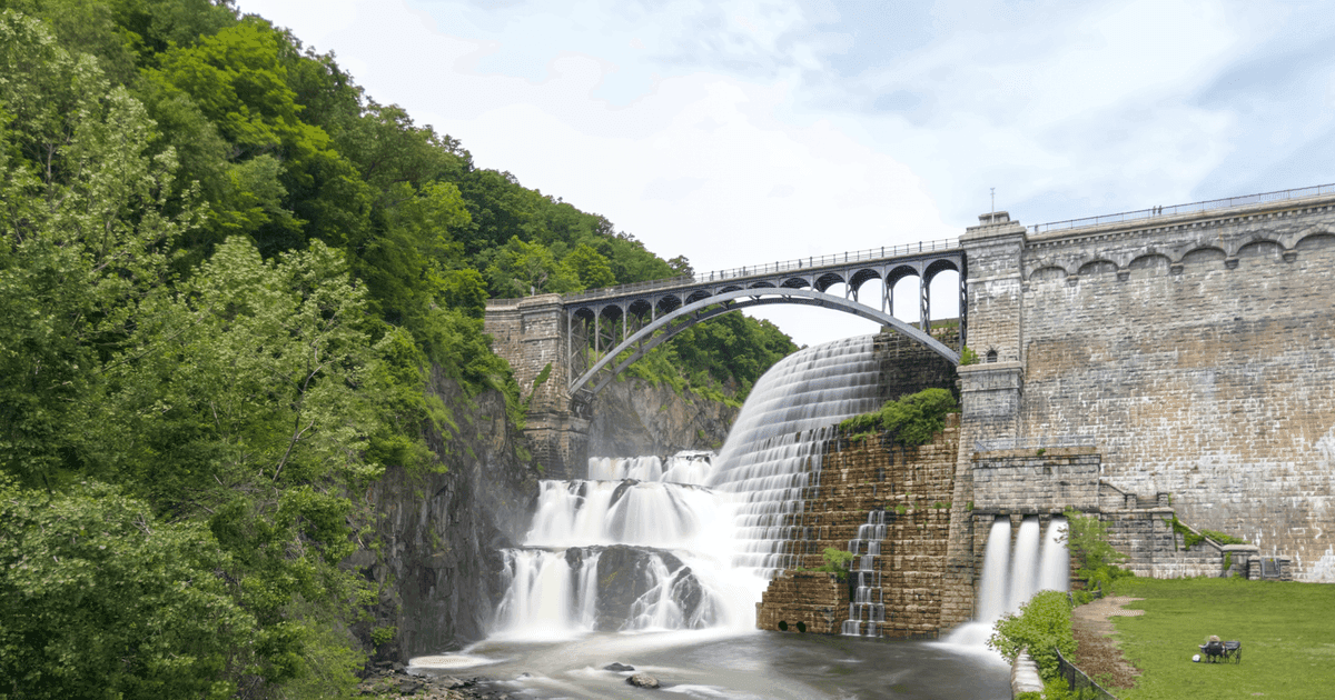Breathtaking view of the Croton Dam and bridge surrounded by lush greenery in Croton-on-Hudson, NY.